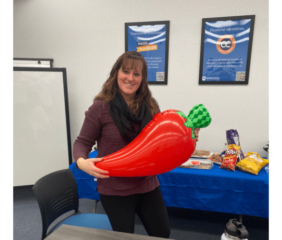 Coordinator of Career Services & Credit for Prior Learning Nichole Wheeler with her prize for winning a chili contest