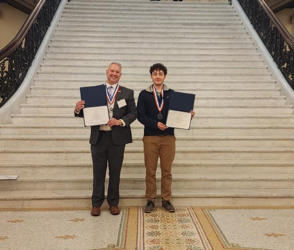 Jon Sawyer (left) and Quint Kunar-Hallas at the Massachusetts State House