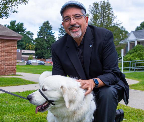 President Luis Pedraja gets a few pets in with Siggy 