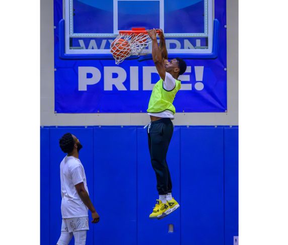 A huge slam dunk at the 2024 QCC Alumni Basketball game