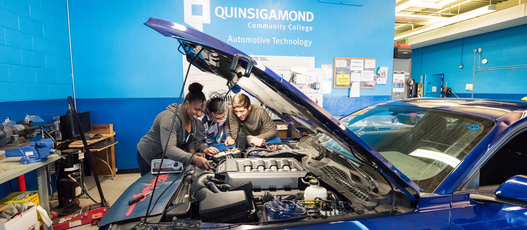QCC students work on a vehicle