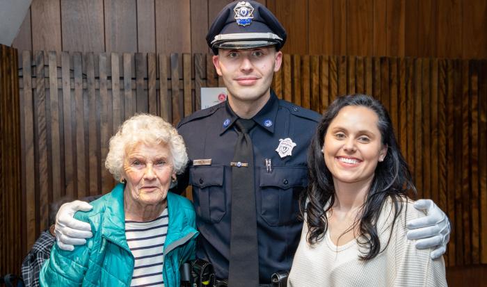 QCC Police Officer Derek Mendes with his grandmother Lani Carroll (left) and sister Elizabeth Mendes