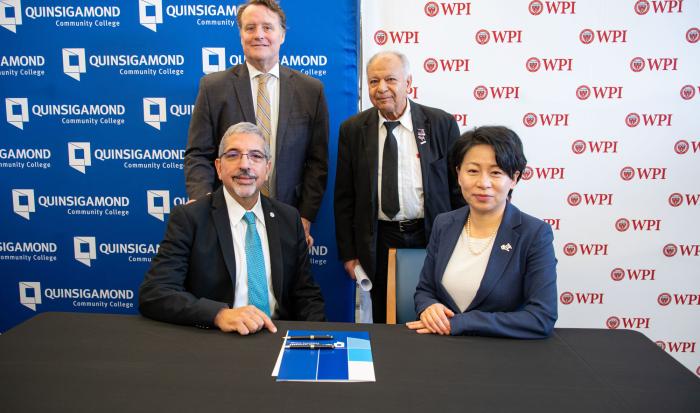 (back row, from left) Mass. State Senator Michael Moore, Professor/Coordinator of Engineering Dadbeh Bigonahy. (front row, from left) QCC President Dr. Luis Pedraja and WPI President Dr. Grace Wang
