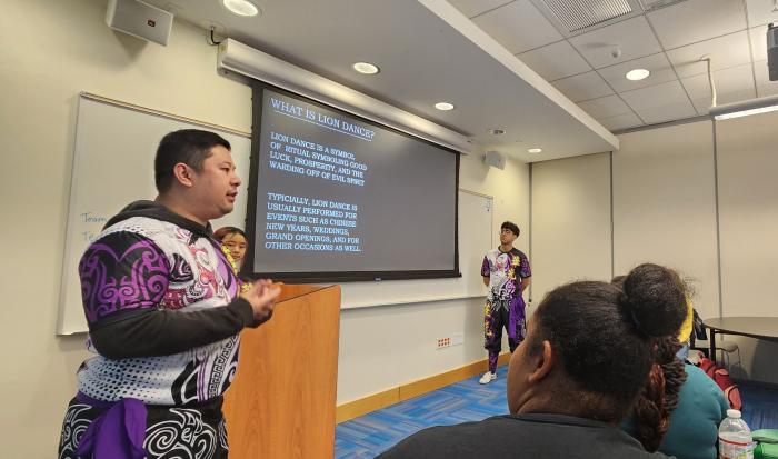 Hai Nguyen of Eternals Lion Dance explained the history and cultural significance of lion dancing. Hai Nguyen of Eternals Lion Dance explained the history and cultural significance of lion dancing.