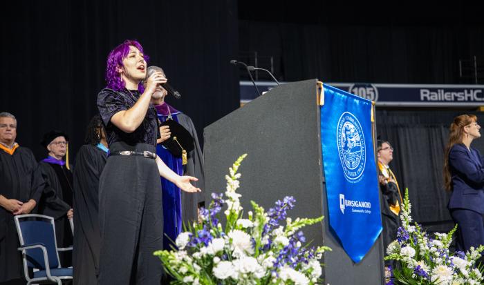 QCC student Sterling Tanacea gives a rousing rendition of The National Anthem. QCC student Sterling Tanacea gives a rousing rendition of The National Anthem.