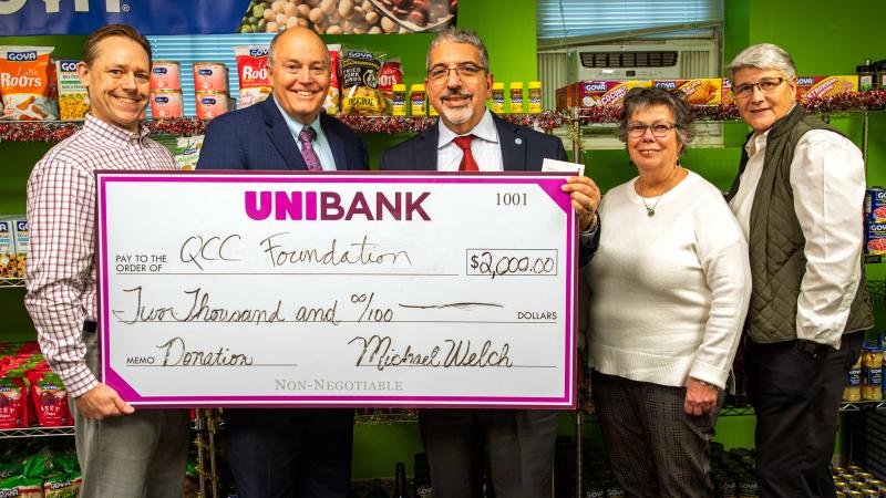 From left: QCC Foundation President Matthew E. Wally, vice president of Government & Community Affairs, UniBank; Unibank CEO Michael W. Welch; QCC President Luis G. Pedraja, Student Resources Manager Bonnie Coleman and Dean of Students Theresa Vecchio. 