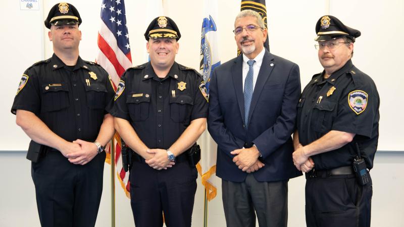 (from left) Deputy Chief of Operations Mike Vigeant, Chief of Police Stephen DiGiovanni, QCC President Dr. Luis Pedraja and Deputy Chief of Administration Reynaldo Rodriguez