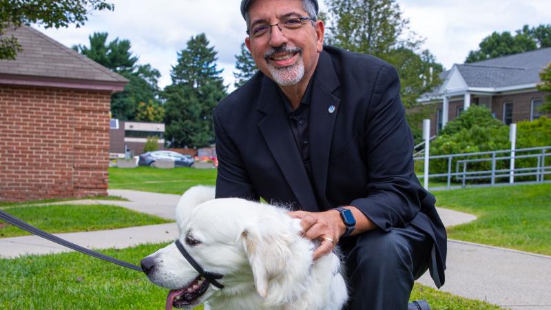 President Luis Pedraja gets a few pets in with Siggy 